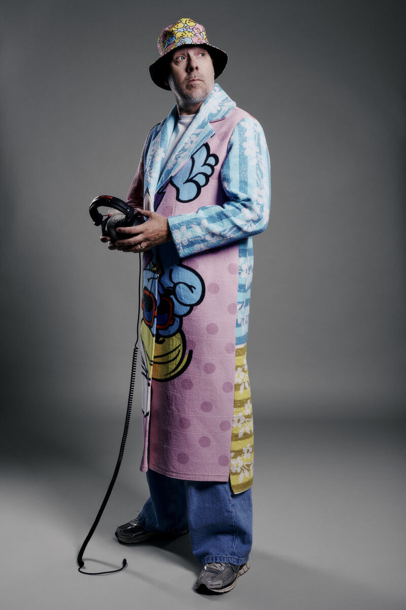 Sebastien Bruce in a long colourful coat